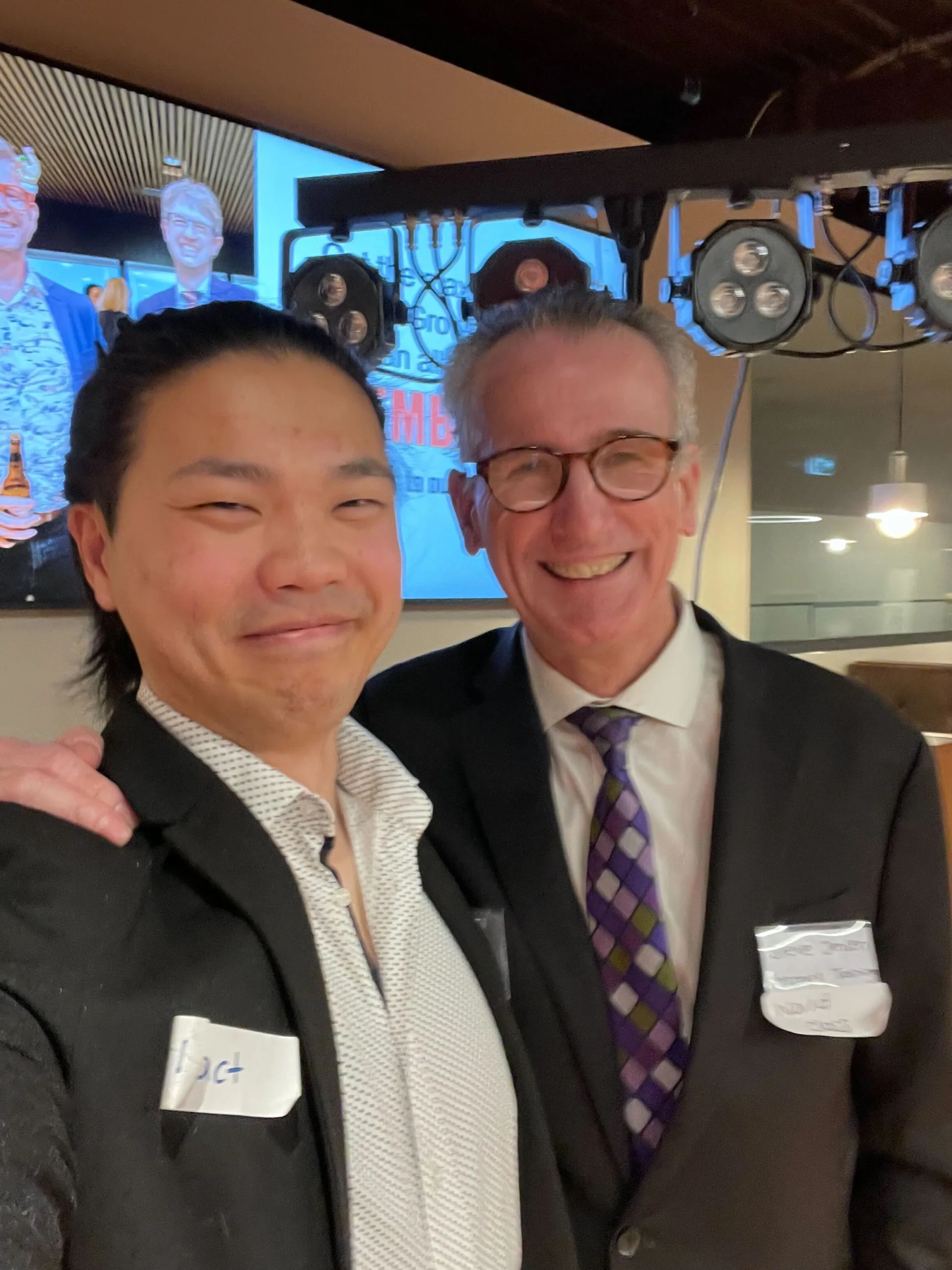 COM Market Leaders owner David Ji posing with owner of Steve Jensen Impact Training