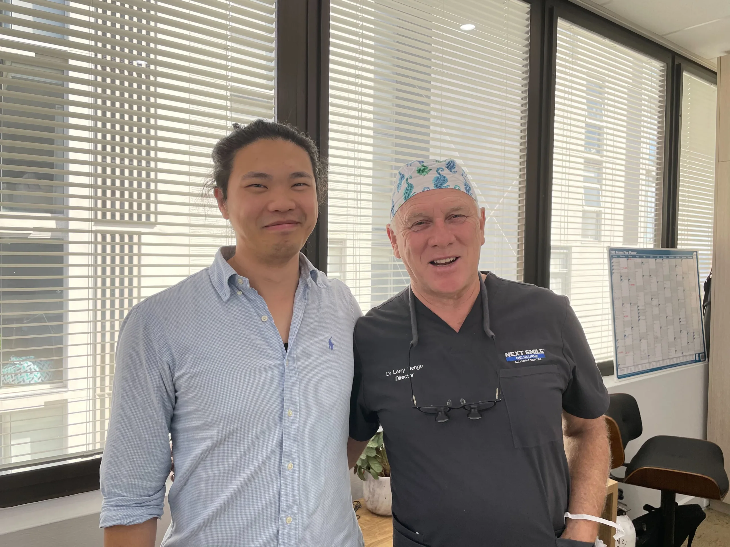 COM Market Leaders owner David Ji posing with owner of Larry Benge Next Smile Australia
